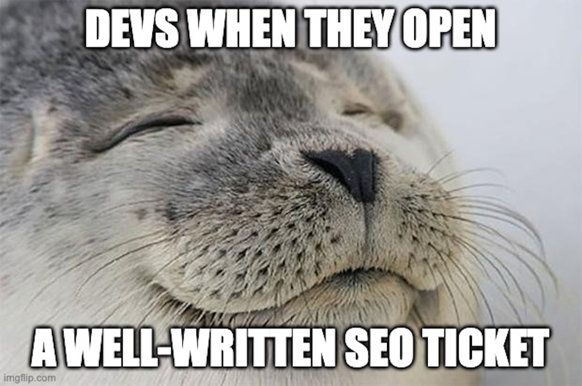 Close-up of a smiling seal (meme) with text: "Devs when they open a well-written SEO ticket."