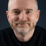 Headshot of Barry Adams